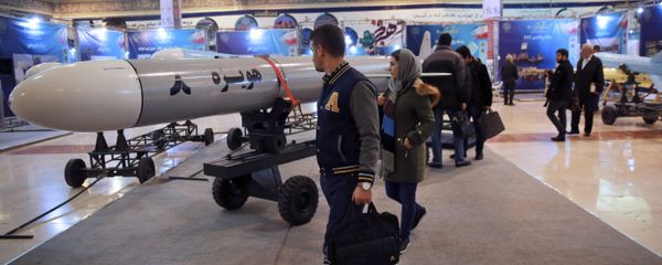 Visitors look at a Hoveizeh 8 cruise missile at a military show marking the 40th anniversary of Iran's Islamic Revolution. Visitors look at a Hoveizeh 8 cruise missile at a military show marking the 40th anniversary of Iran's Islamic Revolution. - Sputnik International