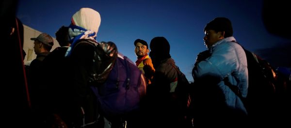 Migrants listen to Mexican authorities in a provisional shelter during their journey towards the United States, in Piedras Negras, Mexico, February 4, 2019. Migrants listen to Mexican authorities in a provisional shelter during their journey towards the United States, in Piedras Negras, Mexico, February 4, 2019. - Sputnik International