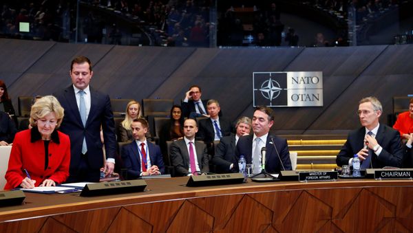 US Ambassador to NATO Kay Bailey Hutchison, Macedonian Foreign Minister Nikola Dimitrov and NATO Secretary General Jens Stoltenberg attend a signature ceremony of the accession protocol between the Republic of North Macedonia and NATO at the Alliance headquarters in Brussels, Belgium February 6, 2019. - Sputnik International