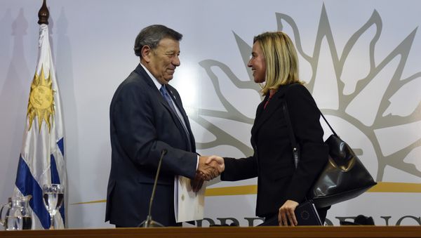 Uruguay's Foreign Affairs Minister Rodolfo Nin, left, and European Union foreign policy chief Federica Mogherini shake hands at the end of an “International Contact Group” meeting regarding the ongoing Venezuelan crisis, in Montevideo, Uruguay,Thursday, Feb. 7, 2019. Uruguayan President Tabare Vazquez is leading the meeting attended by leaders of 14 countries, including Spain, Italy, Portugal and Sweden. Uruguay's Foreign Affairs Minister Rodolfo Nin, left, and European Union foreign policy chief Federica Mogherini shake hands at the end of an “International Contact Group” meeting regarding the ongoing Venezuelan crisis, in Montevideo, Uruguay,Thursday, Feb. 7, 2019. Uruguayan President Tabare Vazquez is leading the meeting attended by leaders of 14 countries, including Spain, Italy, Portugal and Sweden. - Sputnik International