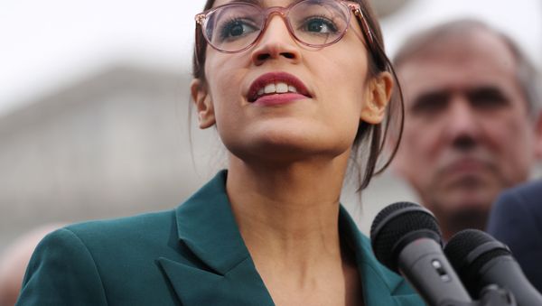 U.S. Representative Alexandria Ocasio-Cortez (D-NY) speaks during a news conference for a proposed Green New Deal to achieve net-zero greenhouse gas emissions in 10 years, at the U.S. Capitol in Washington, U.S. February 7, 2019 - Sputnik International
