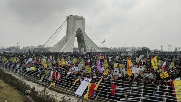 Iranians attend a ceremony celebrating the 40th anniversary of Islamic Revolution, under the Azadi, freedom, tower, in Tehran, Iran, Monday, Feb. 11, 2019 - Sputnik International