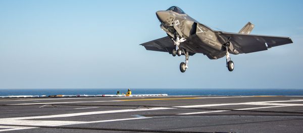 An F-35C Lightning II from the Rough Raiders of Strike Fighter Squadron (VFA) 125 prepares to make an arrested cable landing on the flight deck of the Nimitz-class aircraft carrier USS Carl Vinson (CVN 70). Carl Vinson is conducting fleet replacement squadron carrier qualifications off the coast of Southern California. An F-35C Lightning II from the Rough Raiders of Strike Fighter Squadron (VFA) 125 prepares to make an arrested cable landing on the flight deck of the Nimitz-class aircraft carrier USS Carl Vinson (CVN 70). Carl Vinson is conducting fleet replacement squadron carrier qualifications off the coast of Southern California. - Sputnik International