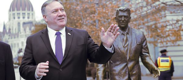 US Secretary of State, Mike Pompeo, is pictured next to a scuplture of former US President Ronald Reagan at the Liberty square (Szabadsag) in Budapest, Hungary, Feb. 11, 2019 US Secretary of State, Mike Pompeo, is pictured next to a scuplture of former US President Ronald Reagan at the Liberty square (Szabadsag) in Budapest, Hungary, Feb. 11, 2019 - Sputnik International