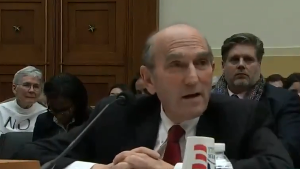 Elliot Abrams, the US special envoy to Venezuela, speaks with Minnesota Congresswoman Ilhan Oman during a House Foreign Affairs Committee hearing Elliot Abrams, the US special envoy to Venezuela, speaks with Minnesota Congresswoman Ilhan Oman during a House Foreign Affairs Committee hearing - Sputnik International