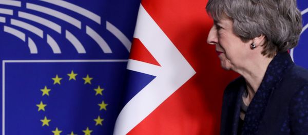 British Prime Minister Theresa May looks on at the EU parliament headquarters in Brussels, Belgium February 7, 2019. British Prime Minister Theresa May looks on at the EU parliament headquarters in Brussels, Belgium February 7, 2019. - Sputnik International