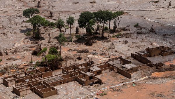 The debris of the municipal school of Bento Rodrigues district, which was covered with mud after a dam owned by Vale SA and BHP Billiton Ltd burst, is pictured in Mariana - Sputnik International