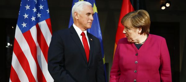 German Chancellor Angela Merkel, right, welcomes United States Vice President Mike Pence, left, for a bilateral meeting during the Munich Security Conference in Munich, Germany, Saturday, Feb. 16, 2019 - Sputnik International