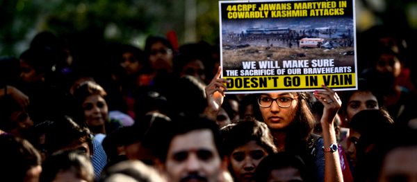 An Indian student holds a poster during a procession to pay tribute to the Central Reserve Police Force (CRPF) troopers in Chennai on February 16, 2019, following an attack on a CRPF convoy in Kashmir An Indian student holds a poster during a procession to pay tribute to the Central Reserve Police Force (CRPF) troopers in Chennai on February 16, 2019, following an attack on a CRPF convoy in Kashmir - Sputnik International