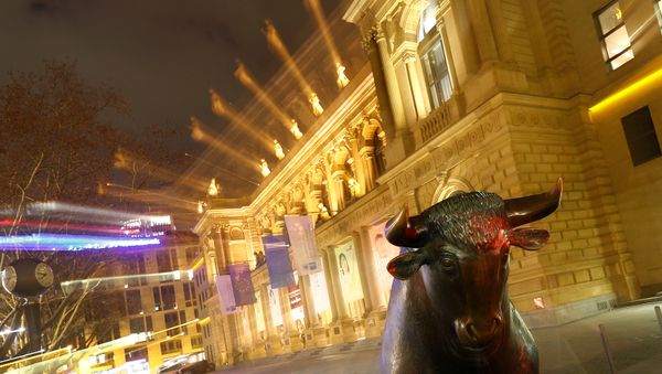 The bull, symbol for successful trading, is seen in front of the German stock exchange (Deutsche Boerse) in Frankfurt, Germany, February 12, 2019 The bull, symbol for successful trading, is seen in front of the German stock exchange (Deutsche Boerse) in Frankfurt, Germany, February 12, 2019 - Sputnik International
