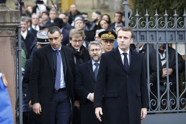 French President Emmanuel Macron, right, with France's Chief Rabbi Haim Korsia, center, leave the Jewish cemetery where tombs were tagged with swastikas in Quatzenheim, eastern France, Tuesday, Feb.19, 2019. French President Emmanuel Macron, right, with France's Chief Rabbi Haim Korsia, center, leave the Jewish cemetery where tombs were tagged with swastikas in Quatzenheim, eastern France, Tuesday, Feb.19, 2019. - Sputnik International