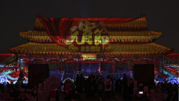 Visitors tour the Forbidden City projected with colorful lights during the Lantern Festival in Beijing, Tuesday, Feb. 19, 2019. Beijing's Palace Museum was illuminated and opened for night visits to celebrate China's Lantern Festival. - Sputnik International