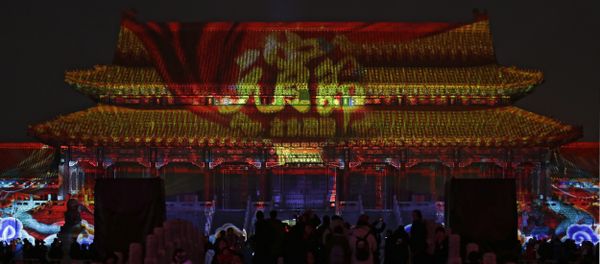 Visitors tour the Forbidden City projected with colorful lights during the Lantern Festival in Beijing, Tuesday, Feb. 19, 2019. Beijing's Palace Museum was illuminated and opened for night visits to celebrate China's Lantern Festival. Visitors tour the Forbidden City projected with colorful lights during the Lantern Festival in Beijing, Tuesday, Feb. 19, 2019. Beijing's Palace Museum was illuminated and opened for night visits to celebrate China's Lantern Festival. - Sputnik International