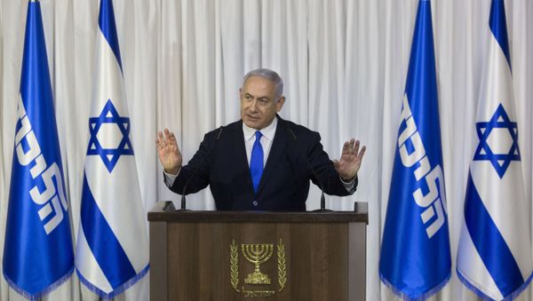 Israeli Prime Minister Benjamin Netanyahu gestures as he delivers a statement in Ramat Gan, Israel, Thursday, Feb. 21, 2019. - Sputnik International