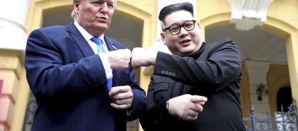 U.S. President Donald Trump impersonator Russell White, left, and Kim Jong-un impersonator Howard X pose for photos outside the Opera House in Hanoi, Vietnam, Friday, Feb. 22, 2019. The second summit between Trump and Kim will take place in Hanoi on Feb. 27 and 28. - Sputnik International