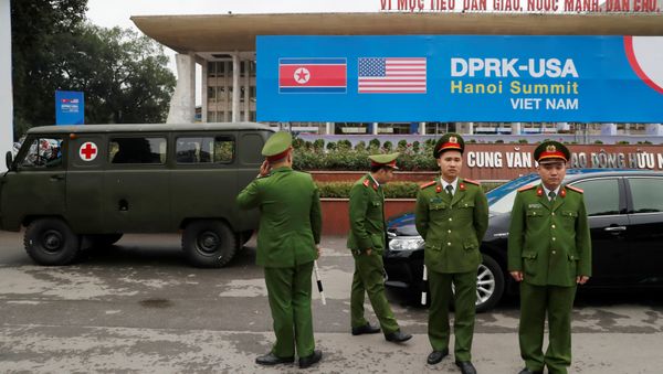 Vietnamese police officers stand guard outside the North Korea-USA summit's media centre in Hanoi, Vietnam, February 23, 2019. - Sputnik International