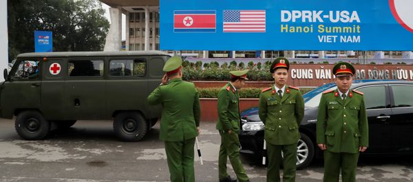 Vietnamese police officers stand guard outside the North Korea-USA summit's media centre in Hanoi, Vietnam, February 23, 2019. - Sputnik International