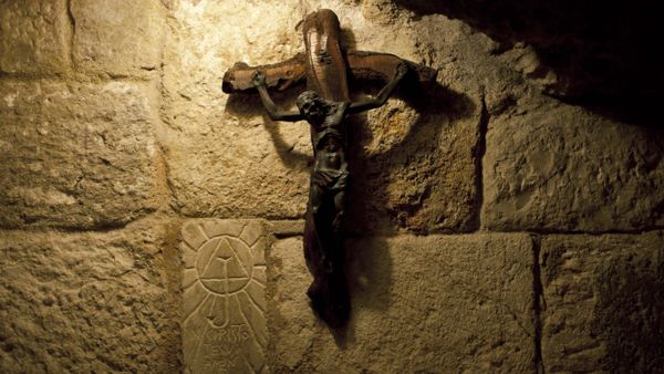 In this Tuesday Dec. 10, 2013 photograph, a crucifix is seen in the St. Jerome's Cave underneath the Church of the Nativity in the West Bank city of Bethlehem. - Sputnik International