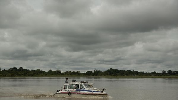 In this Aug. 8, 2018 photo, an ambulance boat crosses the Brahmaputra river in Majuli, in the northeastern Indian state of Assam - Sputnik International