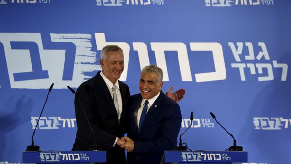 Retired Israeli military chief Benny Gantz, left, smiles with Yair Lapid, head of the Yesh Atid party as they launch joint list for the upcoming Israeli elections in Tel Aviv, Israel, Thursday, Feb. 21, 2019 Retired Israeli military chief Benny Gantz, left, smiles with Yair Lapid, head of the Yesh Atid party as they launch joint list for the upcoming Israeli elections in Tel Aviv, Israel, Thursday, Feb. 21, 2019 - Sputnik International