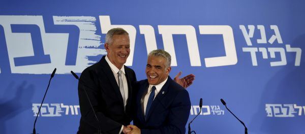 Retired Israeli military chief Benny Gantz, left, smiles with Yair Lapid, head of the Yesh Atid party as they launch joint list for the upcoming Israeli elections in Tel Aviv, Israel, Thursday, Feb. 21, 2019 Retired Israeli military chief Benny Gantz, left, smiles with Yair Lapid, head of the Yesh Atid party as they launch joint list for the upcoming Israeli elections in Tel Aviv, Israel, Thursday, Feb. 21, 2019 - Sputnik International