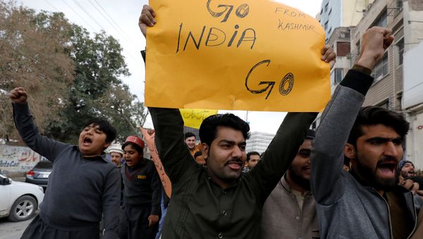 People carry a sign as they chant slogans against what they call airspace violation by the Indian military aircrafts, in a protest in Peshawar, Pakistan February 26, 2019 People carry a sign as they chant slogans against what they call airspace violation by the Indian military aircrafts, in a protest in Peshawar, Pakistan February 26, 2019 - Sputnik International
