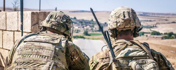 Two US soldiers keep an eye on the demarcation line during a security patrol outside Manbij, Syria, 26 June, 2018 Two US soldiers keep an eye on the demarcation line during a security patrol outside Manbij, Syria, 26 June, 2018 - Sputnik International