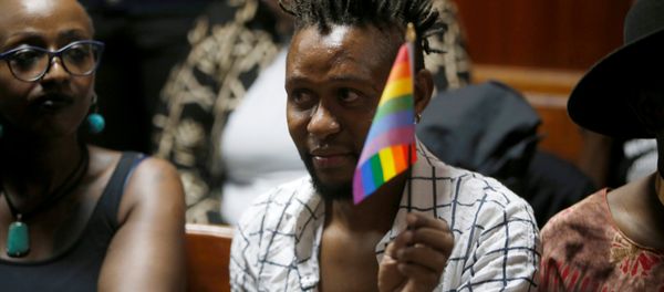 An LGBT activist holds the rainbow flag during a court hearing in the Milimani high Court in Nairobi in Nairobi, Kenya An LGBT activist holds the rainbow flag during a court hearing in the Milimani high Court in Nairobi in Nairobi, Kenya - Sputnik International