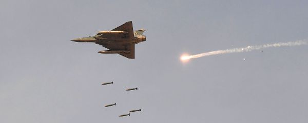 In this photo taken on February 16, 2019, an Indian Air Force (IAF) Mirage-2000 fighter aircraft drops bombs during the 'Vayu Shakti 2019' fire power demonstration at the IAF's firing range field in Pokhran in the state of Rajasthan - Sputnik International