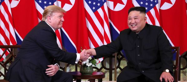 U.S. President Donald Trump and North Korean leader Kim Jong Un shake hands before their one-on-one chat during the second U.S.-North Korea summit at the Metropole Hotel in Hanoi, Vietnam February 27, 2019 - Sputnik International