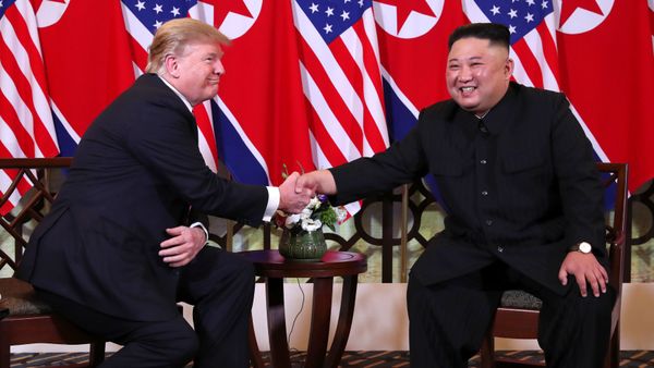 U.S. President Donald Trump and North Korean leader Kim Jong Un shake hands before their one-on-one chat during the second U.S.-North Korea summit at the Metropole Hotel in Hanoi, Vietnam February 27, 2019 - Sputnik International