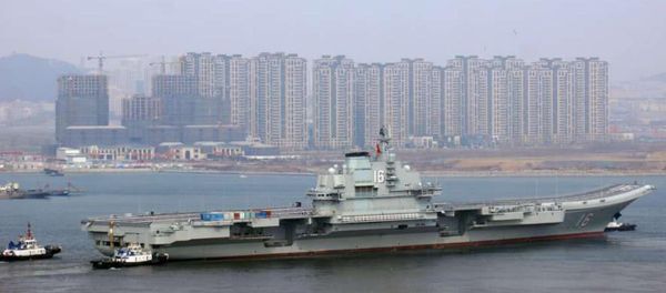 China's aircraft carrier Liaoning departs from the shipyards at Dalian, Liaoning, on February 24, 2019, following a six-month superstructure retrofit - Sputnik International