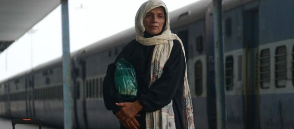Pakistani passengers from the Samjhauta Express arrive from Pakistan at Attari Railway Station, about 35 kms from Amritsar on September 29, 2016 - Sputnik International