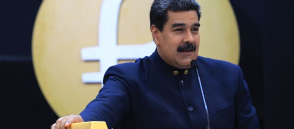 Handout photo released by the Venezuelan Presidency of Venezuelan President Nicolas Maduro speaking next to gold ingots in Caracas on March 22, 2018 Handout photo released by the Venezuelan Presidency of Venezuelan President Nicolas Maduro speaking next to gold ingots in Caracas on March 22, 2018 - Sputnik International