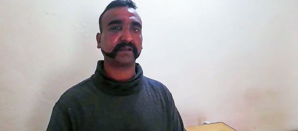 This handout photograph released by Pakistan's Inter Services Public Relations (ISPR) on February 27, 2019, shows captured Indian pilot looking on as holding a cup of tea in the custody of Pakistani forces in an undisclosed location This handout photograph released by Pakistan's Inter Services Public Relations (ISPR) on February 27, 2019, shows captured Indian pilot looking on as holding a cup of tea in the custody of Pakistani forces in an undisclosed location - Sputnik International