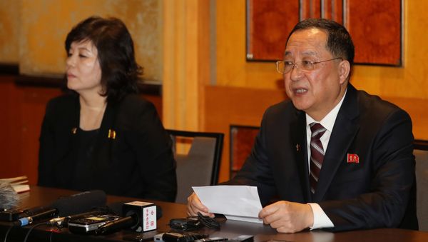 North Korean Foreign Minister Ri Yong Ho (R) speaks at a news conference following the end of a summit between North Korean leader Kim Jong Un and U.S. President Donald Trump, in Hanoi, Vietnam, March 1, 2019. - Sputnik International