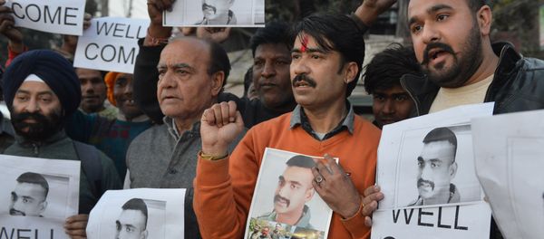 Indian people hold placards and photographs of Indian Air Force pilot Abhinandan Varthaman, as they celebrate the announcement of his soon release, in Amritsar on February 28, 2019. Indian people hold placards and photographs of Indian Air Force pilot Abhinandan Varthaman, as they celebrate the announcement of his soon release, in Amritsar on February 28, 2019. - Sputnik International