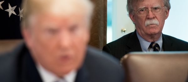 US President Donald Trump speaks alongside National Security Adviser John Bolton (R) during a Cabinet Meeting in the Cabinet Room of the White House in Washington, DC, May 9, 2018 - Sputnik International