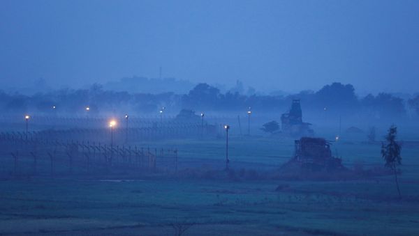 Indian Border Security Force (BSF) bunkers are pictured near the fenced border with Pakistan in Ranbir Singh Pura sector near Jammu March 1, 2019 - Sputnik International