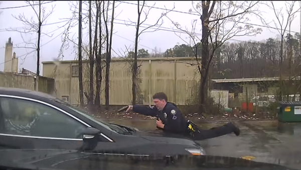 Arkansas' Little Rock Police Department releases footage showing deadly officer-involved shooting - Sputnik International