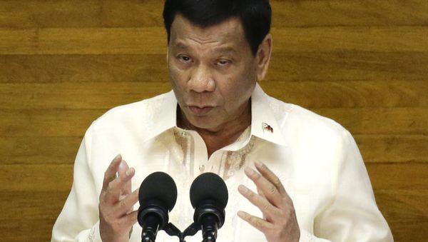 Philippine President Rodrigo Duterte gestures during his third State of the Nation Address at the House of Representatives in Quezon city, metropolitan Manila, Philippines Monday July 23, 2018 - Sputnik International