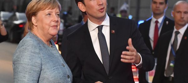 German Chancellor Angela Merkel talks to Austrian Chancellor Sebastian Kurz, right, when arriving at the informal EU summit in Salzburg, Austria, Wednesday, Sept. 19, 2018. German Chancellor Angela Merkel talks to Austrian Chancellor Sebastian Kurz, right, when arriving at the informal EU summit in Salzburg, Austria, Wednesday, Sept. 19, 2018. - Sputnik International