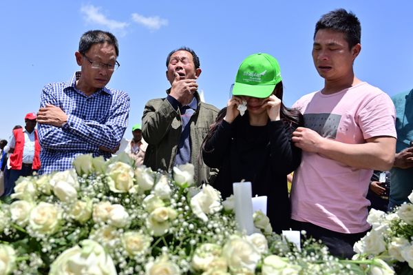Family members mourn the victims at the crash site of the Ethiopian Airlines operated Boeing 737 MAX aircraft, at Hama Quntushele village in the Oromia region, on March 13, 2019 Family members mourn the victims at the crash site of the Ethiopian Airlines operated Boeing 737 MAX aircraft, at Hama Quntushele village in the Oromia region, on March 13, 2019 - Sputnik International