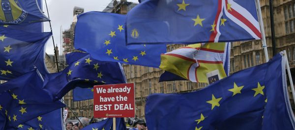 An anti-Brexit pro-remain supporter shouts out during a gathering outside the House of Parliament in London, Tuesday, March 12, 2019. - Sputnik International