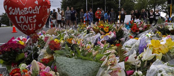 Mourners pay their respects at a makeshift memorial near the Masjid Al Noor mosque in Christchurch, New Zealand, Saturday, March 16, 2019 Mourners pay their respects at a makeshift memorial near the Masjid Al Noor mosque in Christchurch, New Zealand, Saturday, March 16, 2019 - Sputnik International