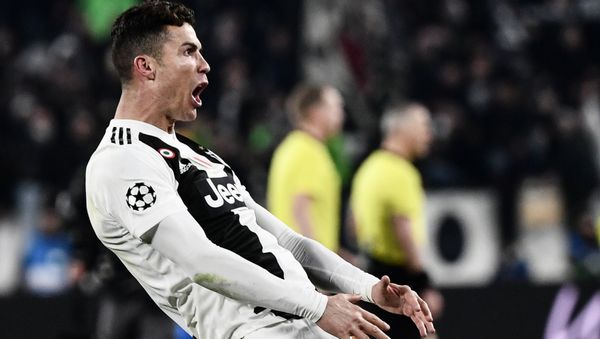 Juventus' Portuguese forward Cristiano Ronaldo celebrates after scoring 3-0 during the UEFA Champions League round of 16 second-leg football match Juventus vs Atletico Madrid on March 12, 2019 at the Juventus stadium in Turin. Juventus' Portuguese forward Cristiano Ronaldo celebrates after scoring 3-0 during the UEFA Champions League round of 16 second-leg football match Juventus vs Atletico Madrid on March 12, 2019 at the Juventus stadium in Turin. - Sputnik International