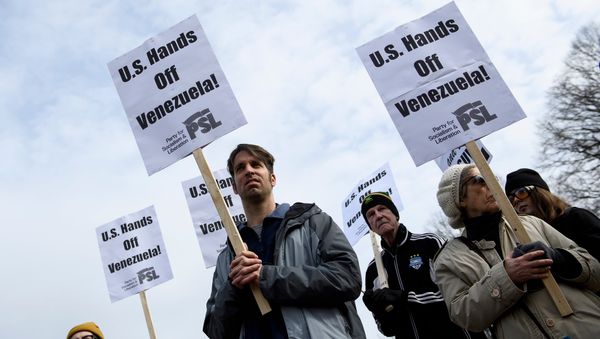Activists rally against US intervention in Venezuela outside White House on January 26, 2019 in Washington, DC. Activists rally against US intervention in Venezuela outside White House on January 26, 2019 in Washington, DC. - Sputnik International