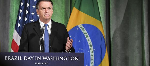 Brazil's President Jair Bolsonaro speaks during a discussion on US-Brazil relations at the US Chamber of Commerce in Washington, DC on March 18, 2019. - Sputnik International