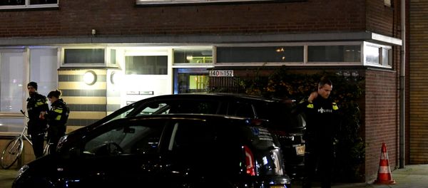 Police officers are seen in front the building where the main suspect of the shooting has been arrested in Utrecht, Netherlands, March 18, 2019. - Sputnik International