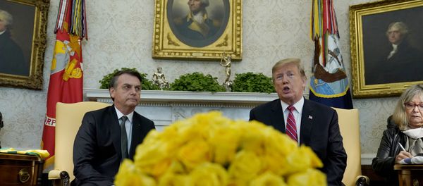 U.S. President Donald Trump speaks while meeting with Brazilian President Jair Bolsonaro in Oval Office of the White House in Washington, U.S., March 19, 2019. - Sputnik International